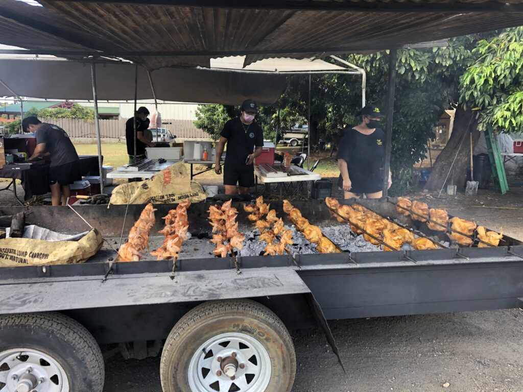 The chicken is fresh and hot when you order from Ray's Kiawe Broiled Chicken in Haleiwa. The constant turning method of cooking keeps the moisture distributed within the chicken. 