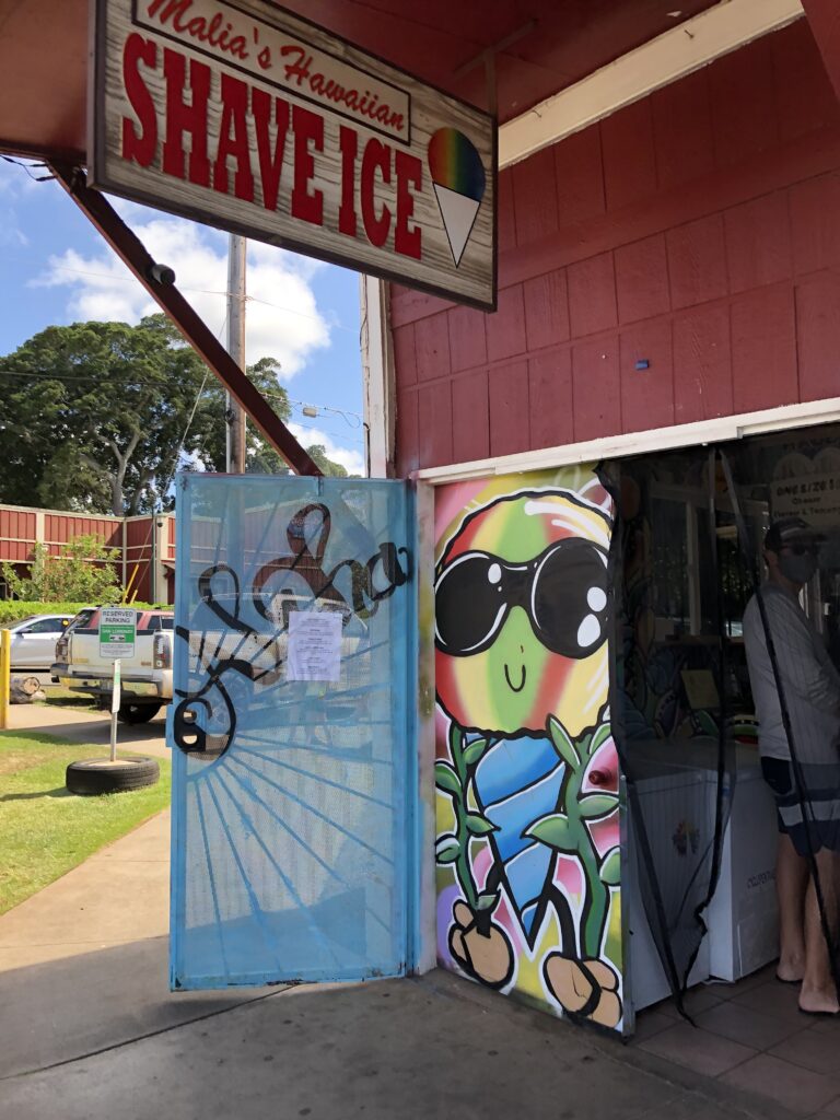 There is a cute spray paint art you may want to take a picture next to in Haleiwa. Its at the Malia's Hawaiian Shave Ice. Its so cute. 