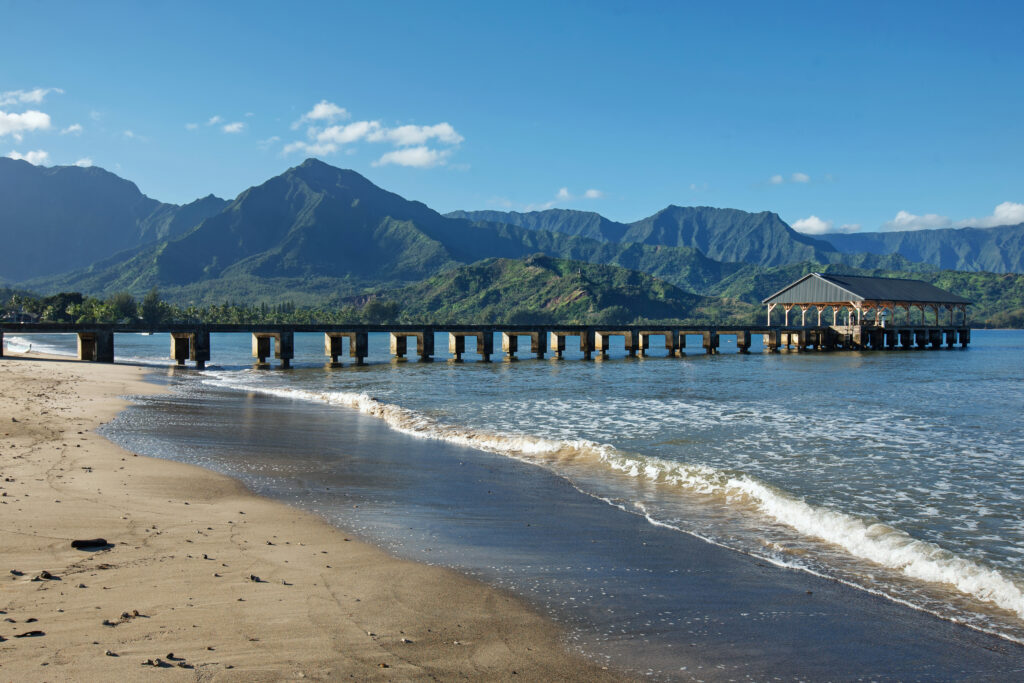 The Hanalei Pier on the North side of the Island of Kauai is very popular. The backdraft of the green lush mountains makes amazing photos. 