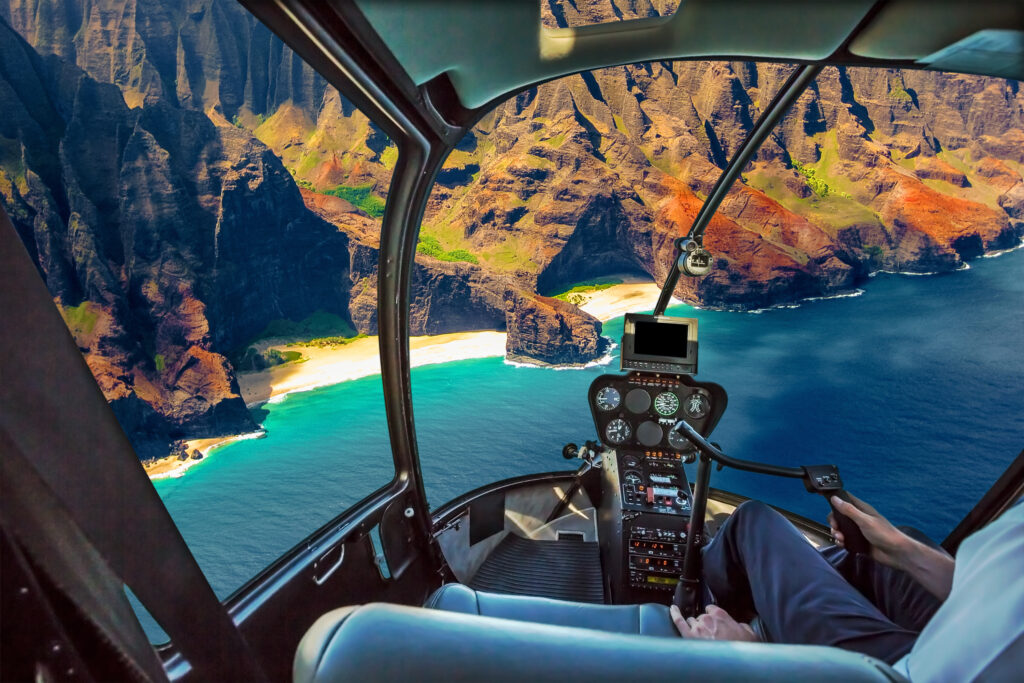 If your budget allows, consider taking a helicopter ride over the Island of Kauai to get a birds view over the Garden Isle. 